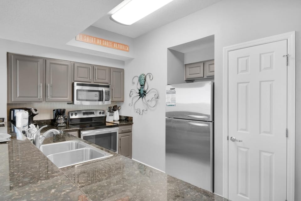 Condo, 1 Queen Bed with Sofa bed (Ariel Dunes I 1006) | Private kitchen | Oven, toaster