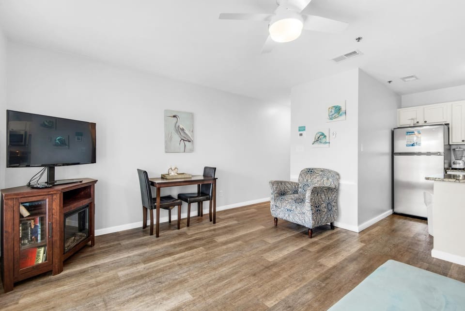 Condo, 1 Queen Bed with Sofa bed (Grand Caribbean West 303) | Living area | TV