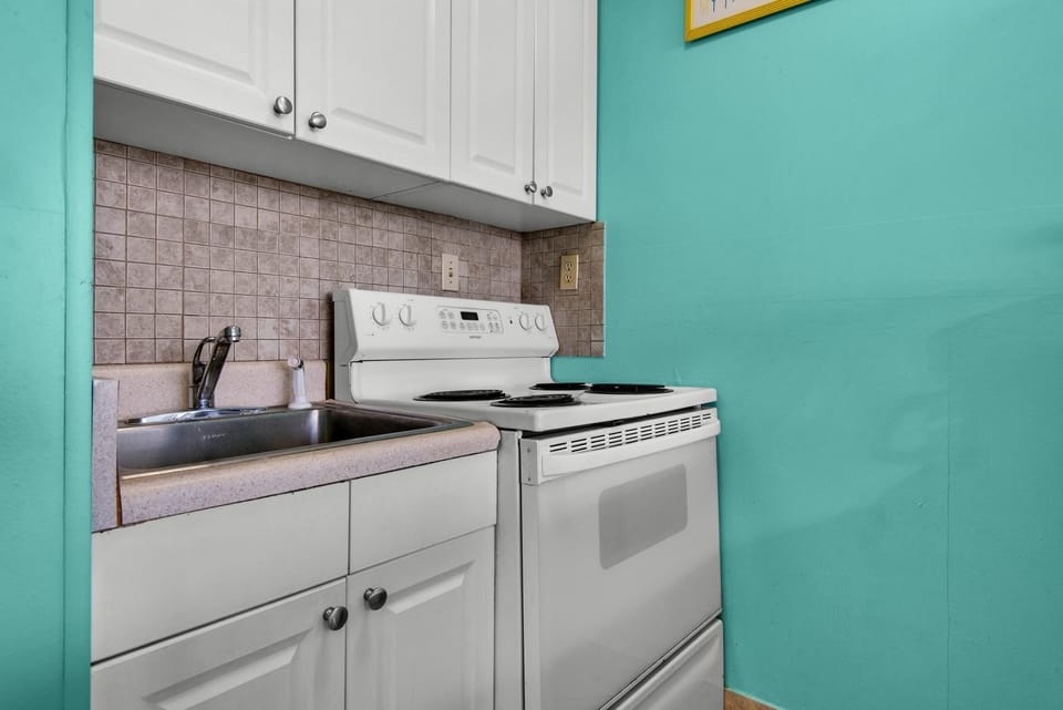 Studio, 1 Queen Bed with Sofa bed (Top of the Gulf 210) | Private kitchen | Oven, toaster