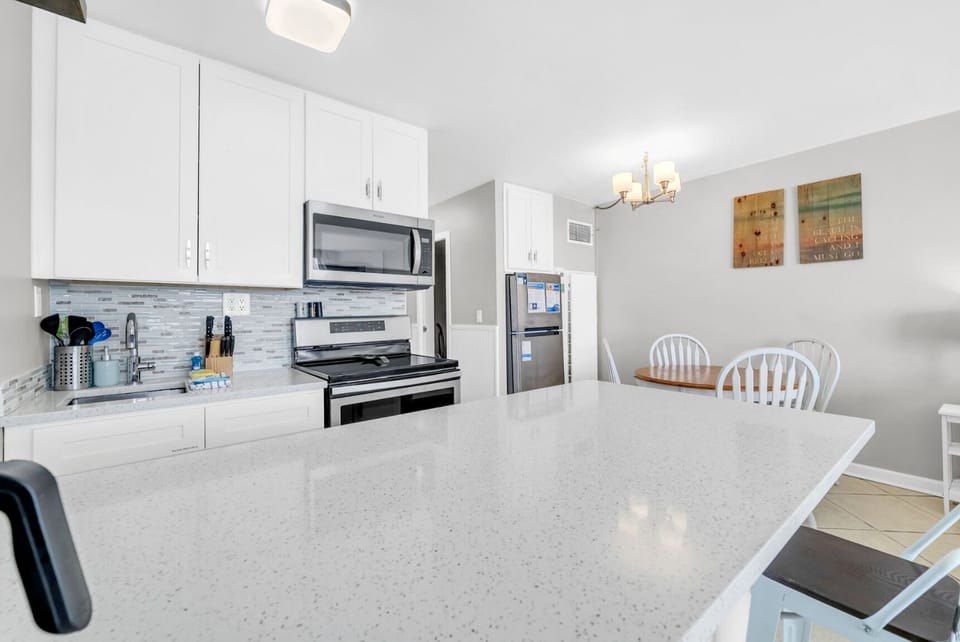 Studio, 2 Queen Beds (Top of the Gulf 813) | Private kitchen | Oven, toaster