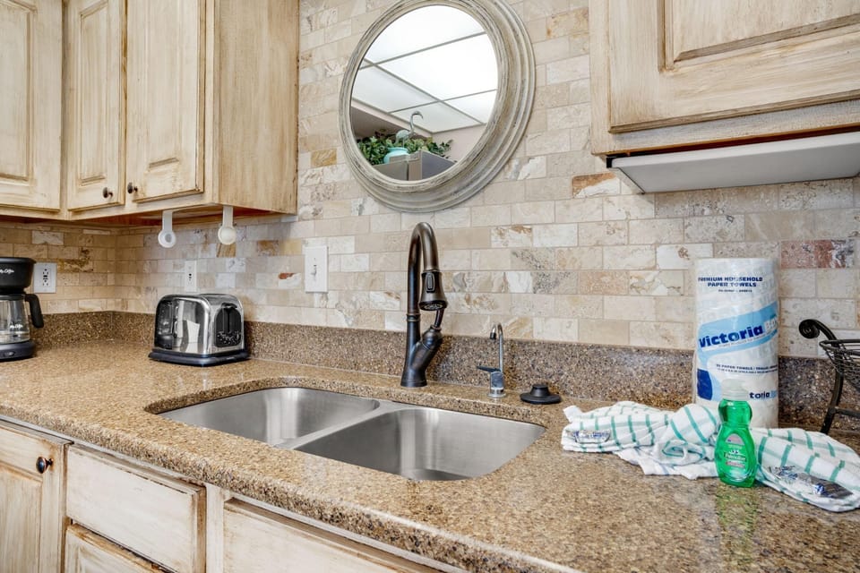 Condo, Multiple Beds (Enclave 401A) | Private kitchen | Oven, toaster