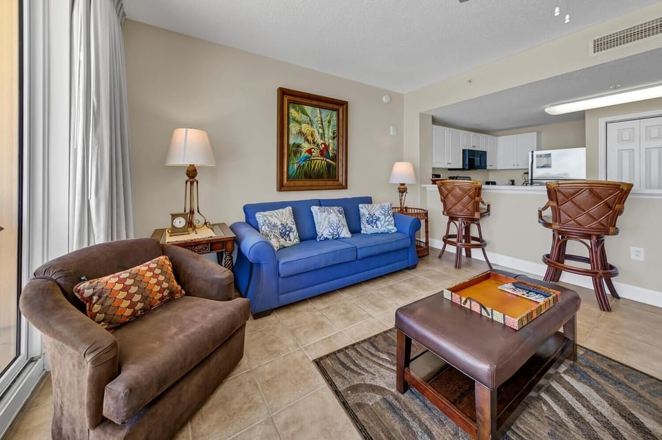 Condo, Multiple Beds (Majestic Beach Towers 1-407) | Living area | TV