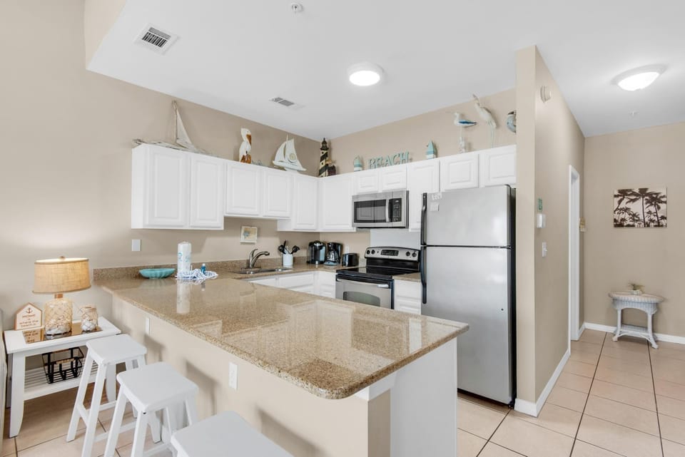 Condo, Multiple Beds (Caribbean Dunes 225) | Private kitchen | Oven, toaster