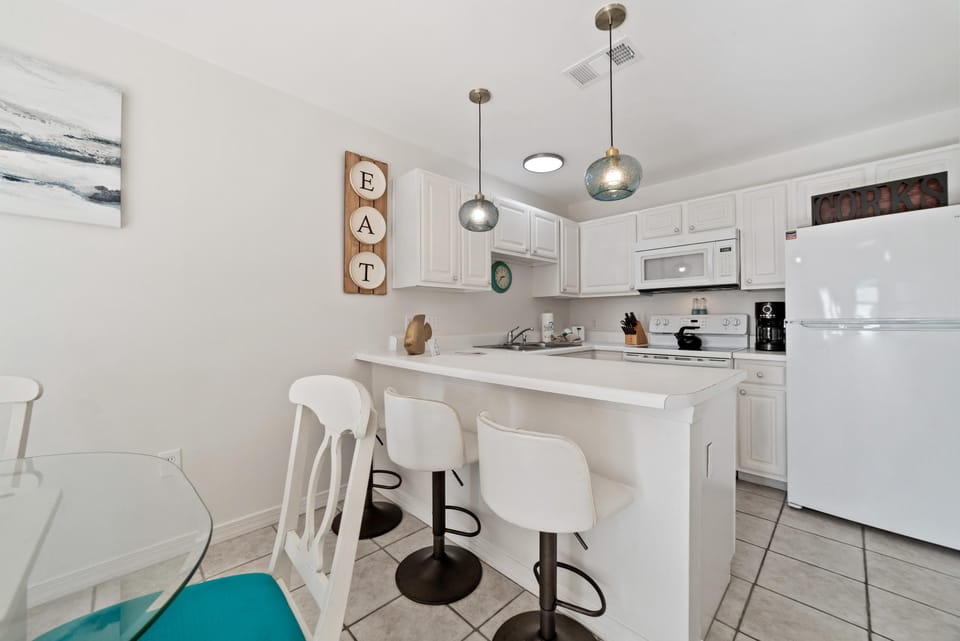 Condo, 1 King Bed with Sofa bed (Grand Caribbean West 205) | Private kitchen | Oven, toaster, paper towels