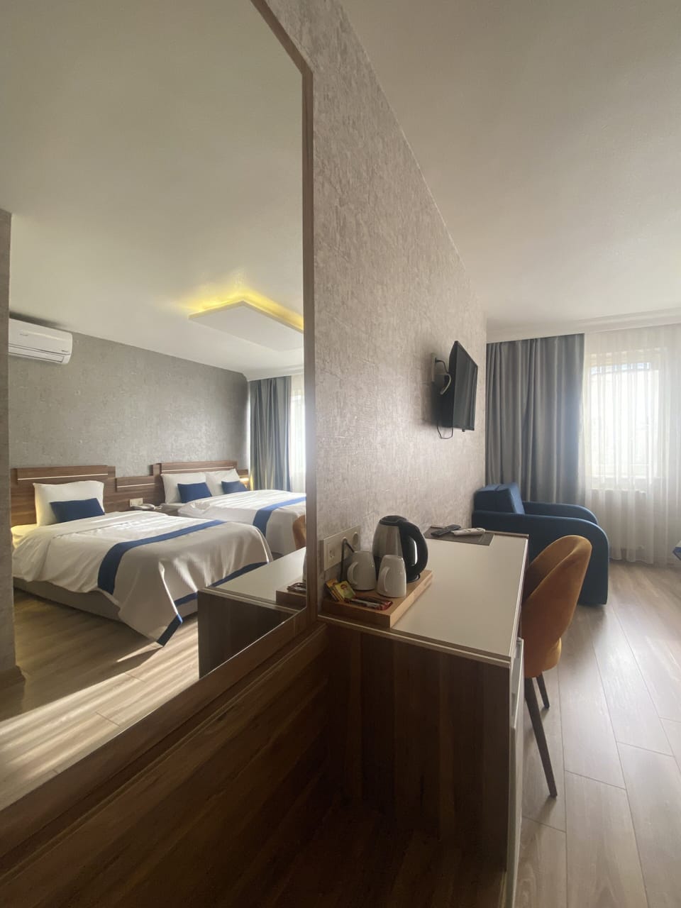 Deluxe Quadruple Room | Minibar, in-room safe, iron/ironing board, free WiFi