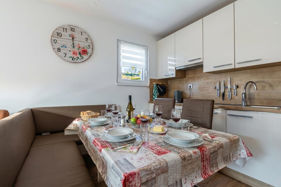 Family House, Multiple Bedrooms, Mountainside (Cozy Apartment Bovec) | Private kitchen | Fridge, oven, stovetop, coffee/tea maker