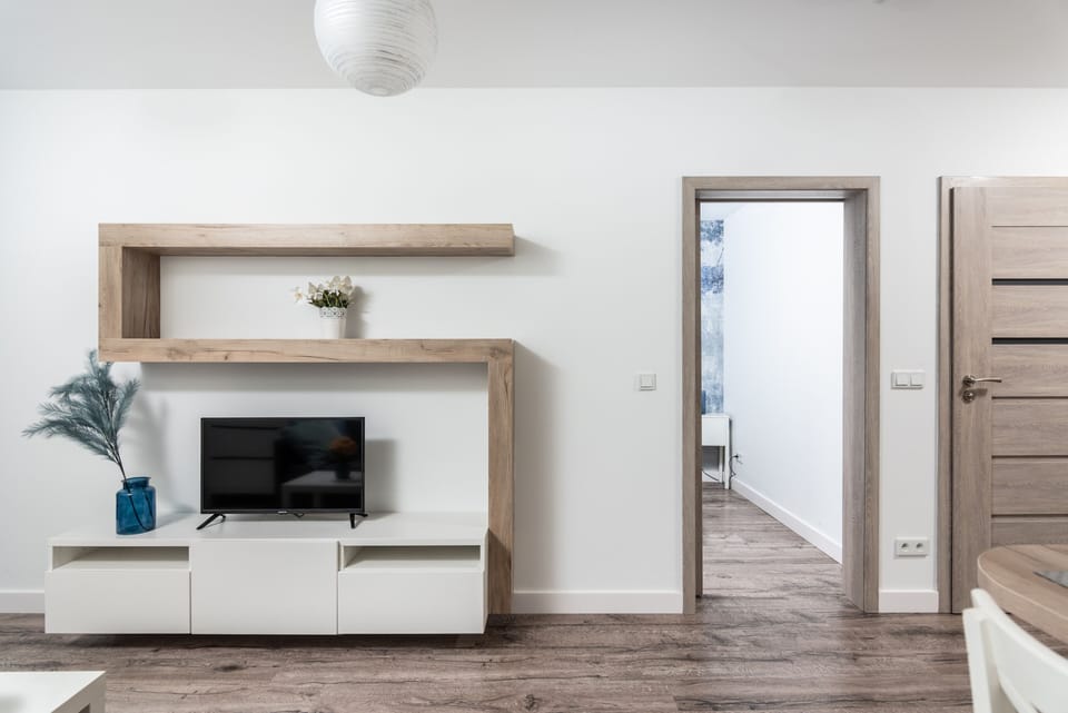8. Blossom - Old Town Residence | Living area | Flat-screen TV