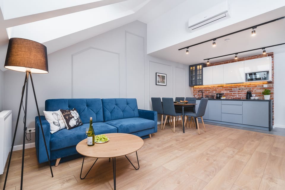 12. One Bedroom Apartment - Saint Florian's Suites | Living room | Flat-screen TV
