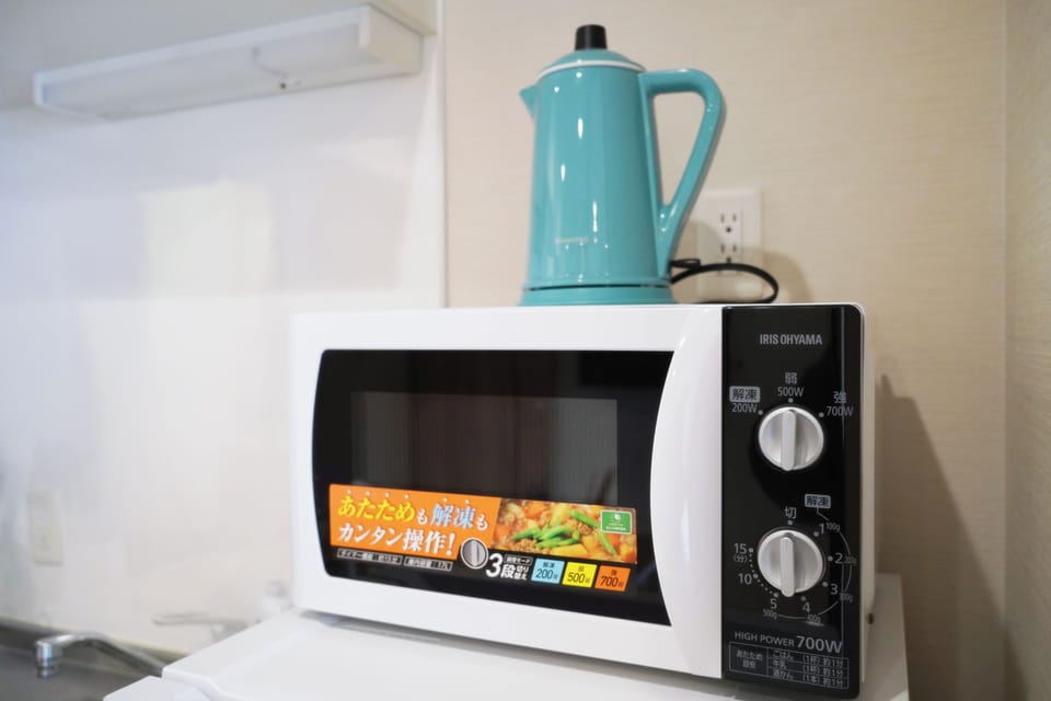 Classic Condo, 2 Double Beds, City View | Private kitchen | Fridge, microwave, oven, stovetop