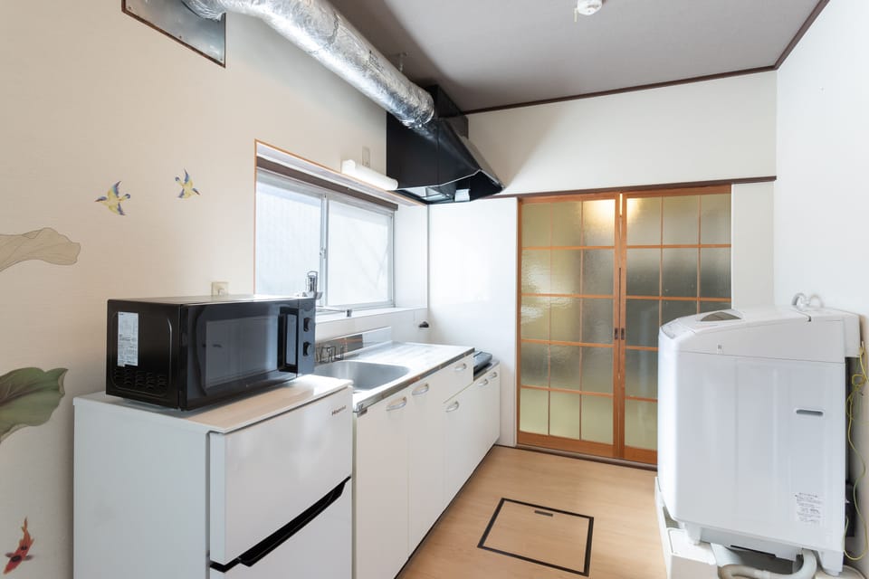 Traditional House | Private kitchen | Fridge, microwave, stovetop, electric kettle