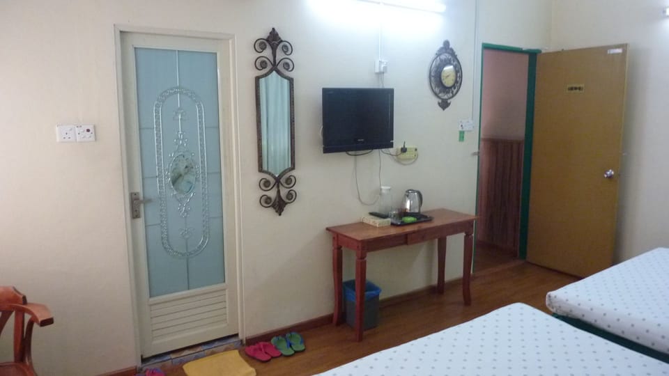 Family Room, 2 Queen Beds | Desk, blackout drapes, iron/ironing board, free WiFi