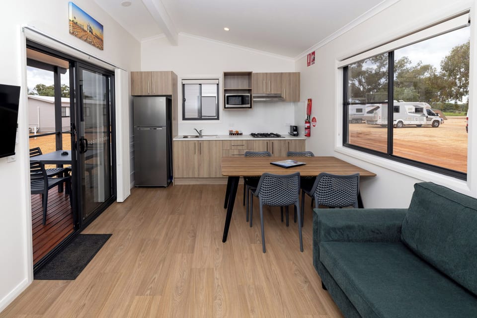 Deluxe Balcony 2 Bedroom Villa | Living area | 32-inch flat-screen TV with satellite channels