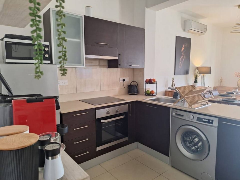 Family Apartment | Private kitchen | Espresso maker, coffee/tea maker, full-size fridge, microwave