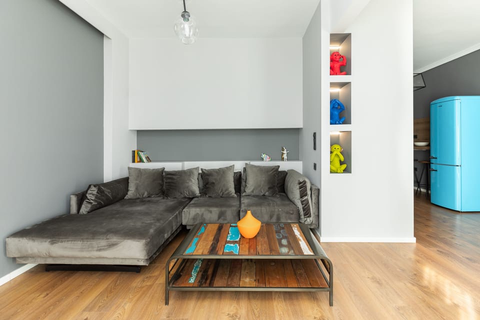 City Apartment | Living area | 40-inch Smart TV with cable channels