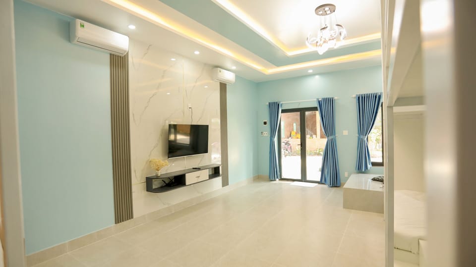 Junior Room | Living area | TV