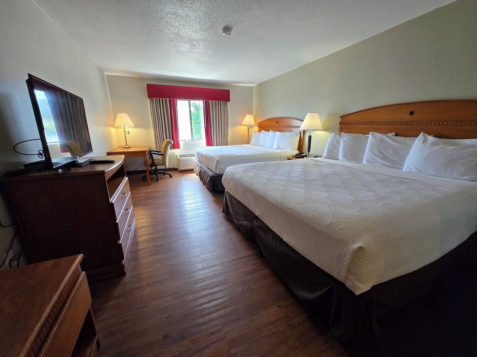 Family Quadruple Room, Multiple Beds | Premium bedding, pillowtop beds, desk, laptop workspace