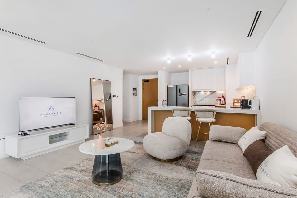 Elite Apartment, 2 Bedrooms, Balcony, Sea View | Living room | 50-inch LCD TV with digital channels