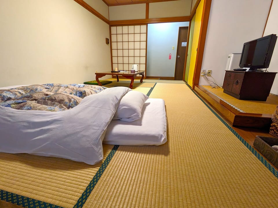 Japanese Style Room, Non Smoking | Desk, WiFi (free), bed sheets