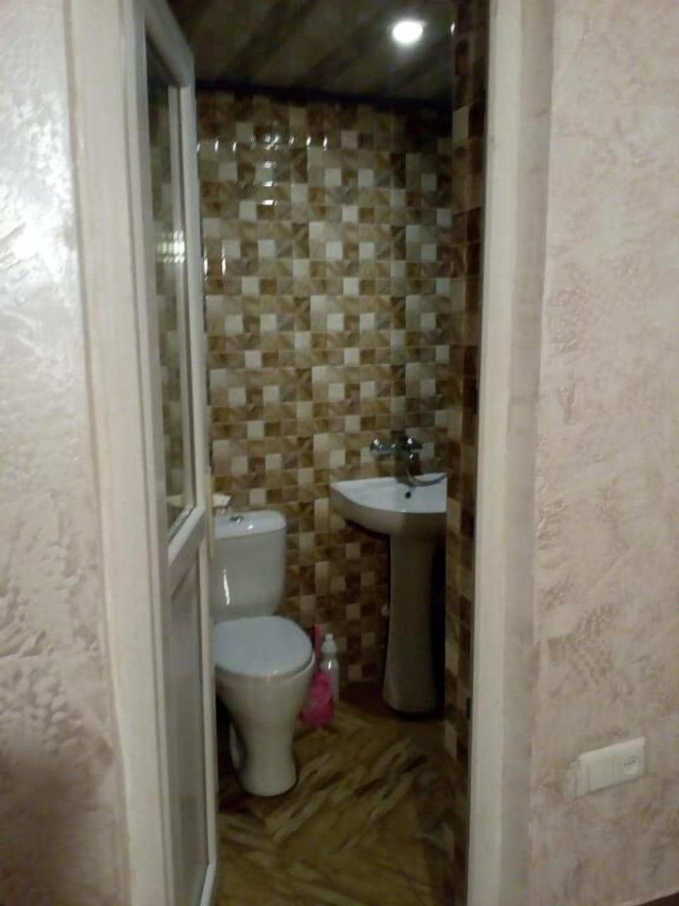 Separate tub and shower, free toiletries, hair dryer, slippers