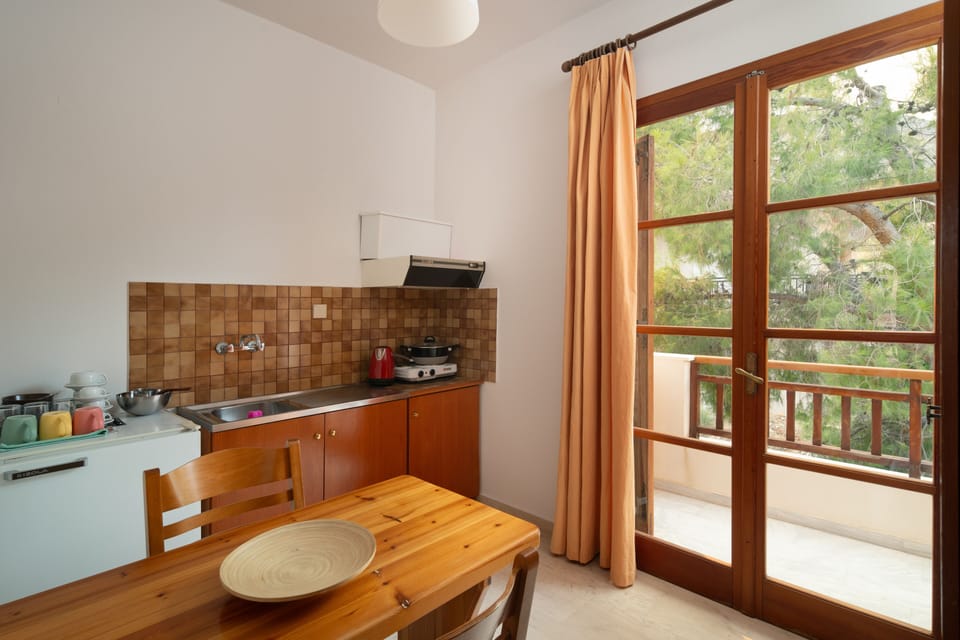 Comfort Triple Room, Balcony, Garden View | Individually decorated, desk, laptop workspace, iron/ironing board