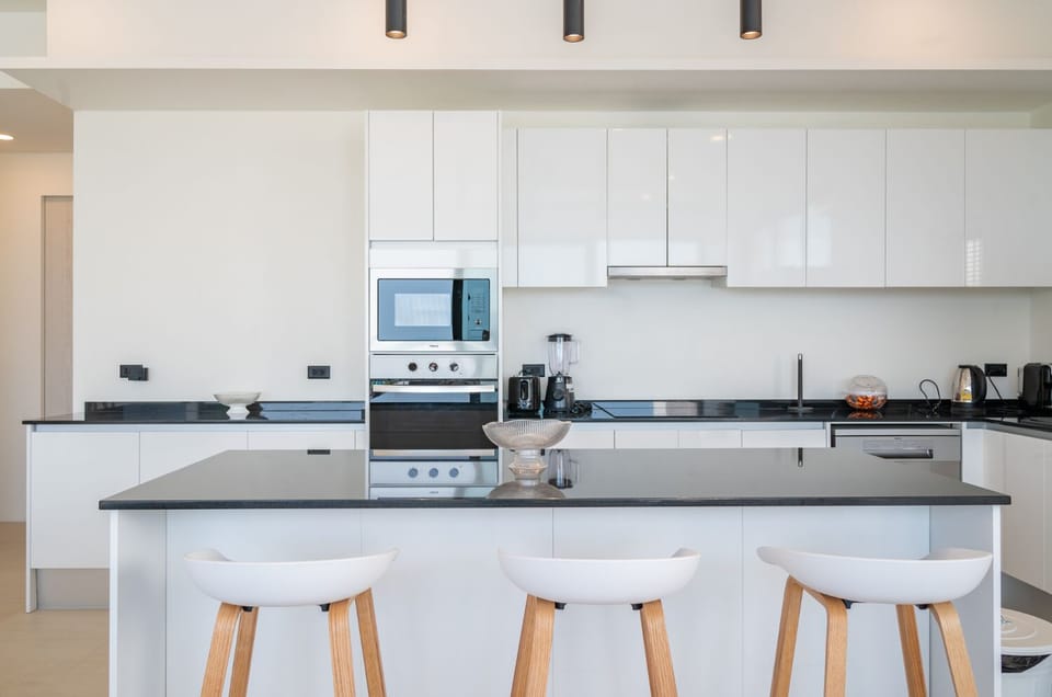 Exclusive Villa | Private kitchen | Full-size fridge, microwave, oven, stovetop