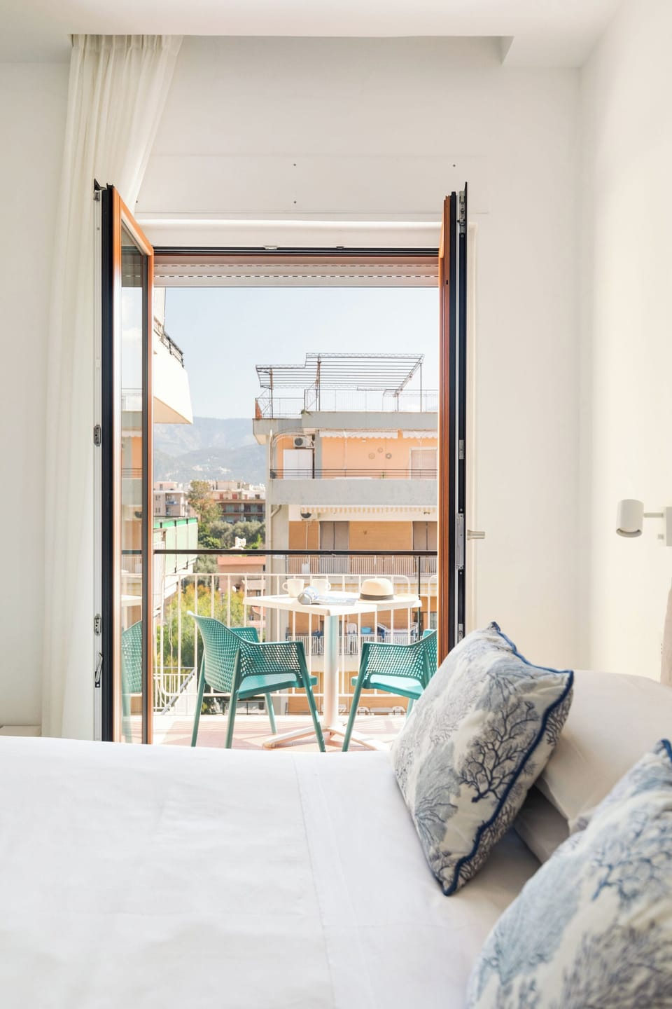 Deluxe Room, Balcony | Minibar, in-room safe, desk, free WiFi