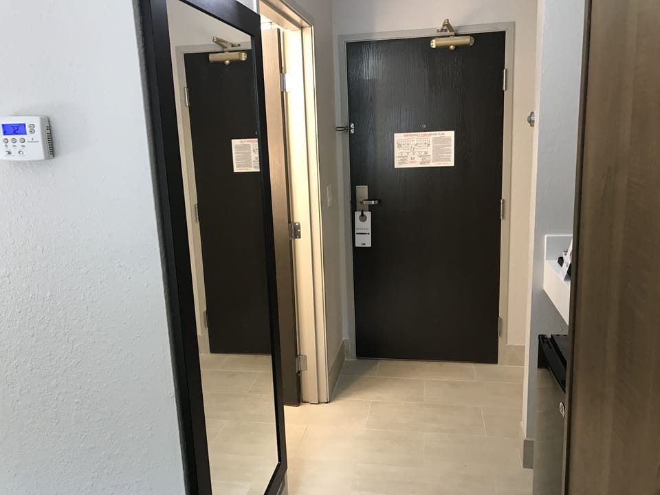 Standard Room, 1 King Bed (Walk-In Shower) | In-room safe, desk, blackout drapes, iron/ironing board