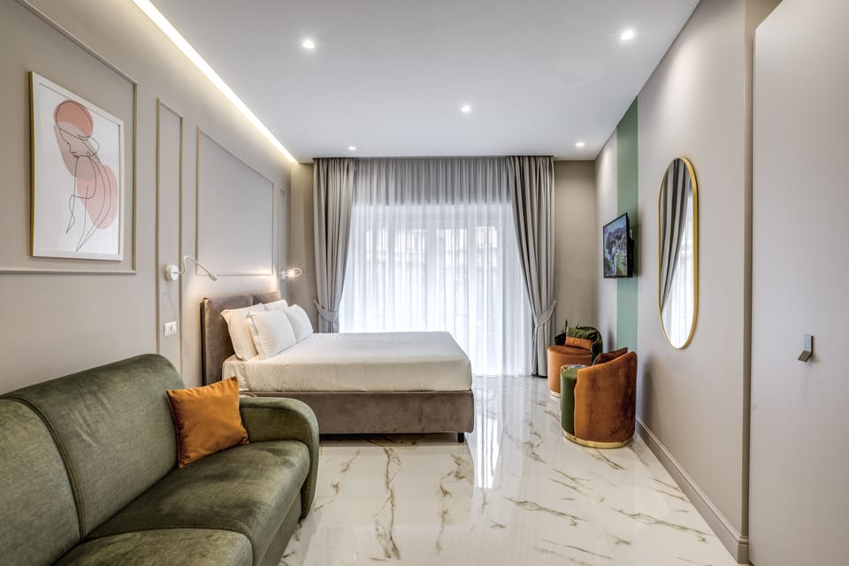 Classic Quadruple Room | Minibar, in-room safe, desk, blackout drapes