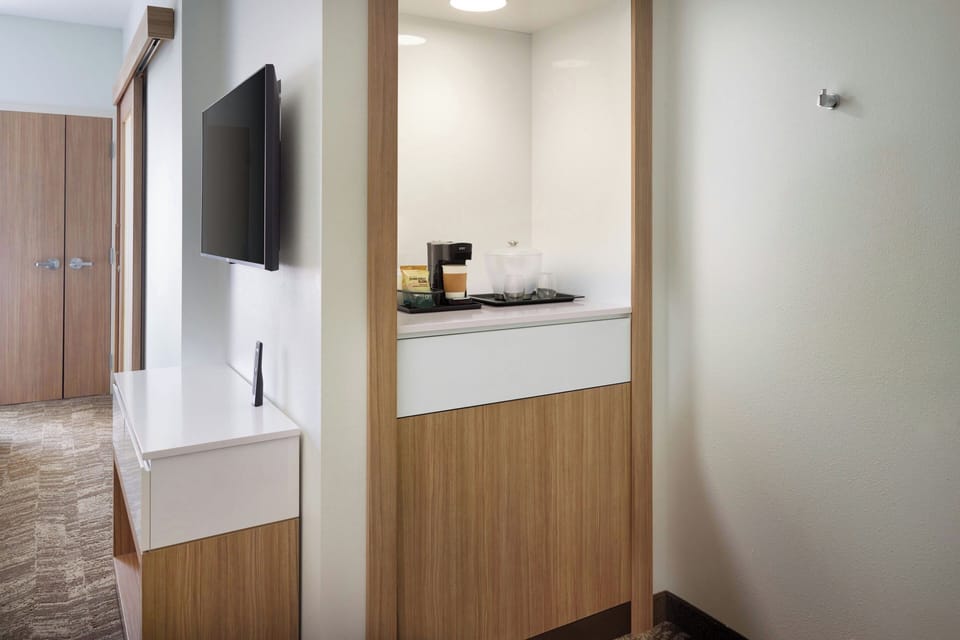 Blackout drapes, iron/ironing board, free WiFi, bed sheets