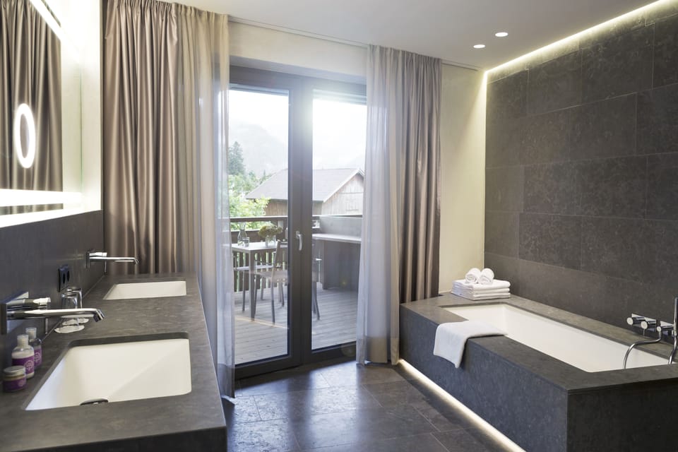 Suite, Balcony (Prestige Living) | Bathroom | Free toiletries, hair dryer, bathrobes, slippers