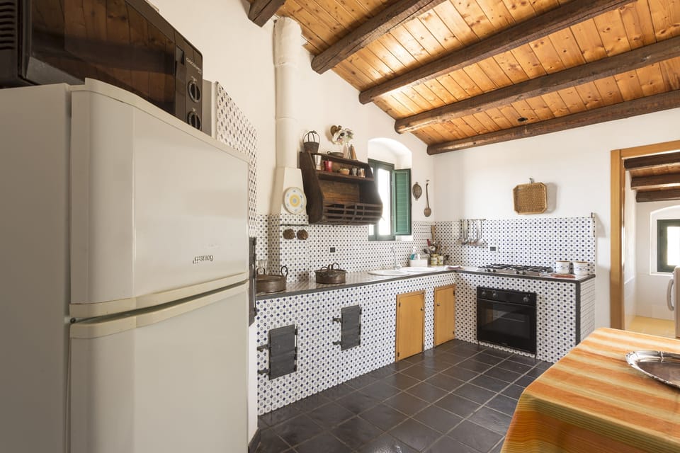 Exclusive House, 6 Bedrooms | Private kitchen | Full-size fridge, stovetop, espresso maker, cookware/dishes/utensils