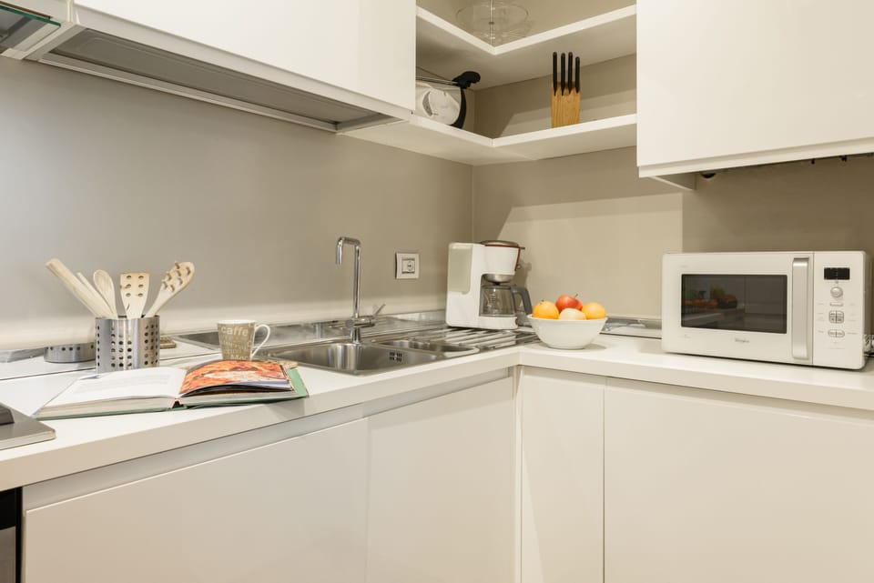 Comfort Apartment | Private kitchen | Microwave, oven, stovetop, cookware/dishes/utensils
