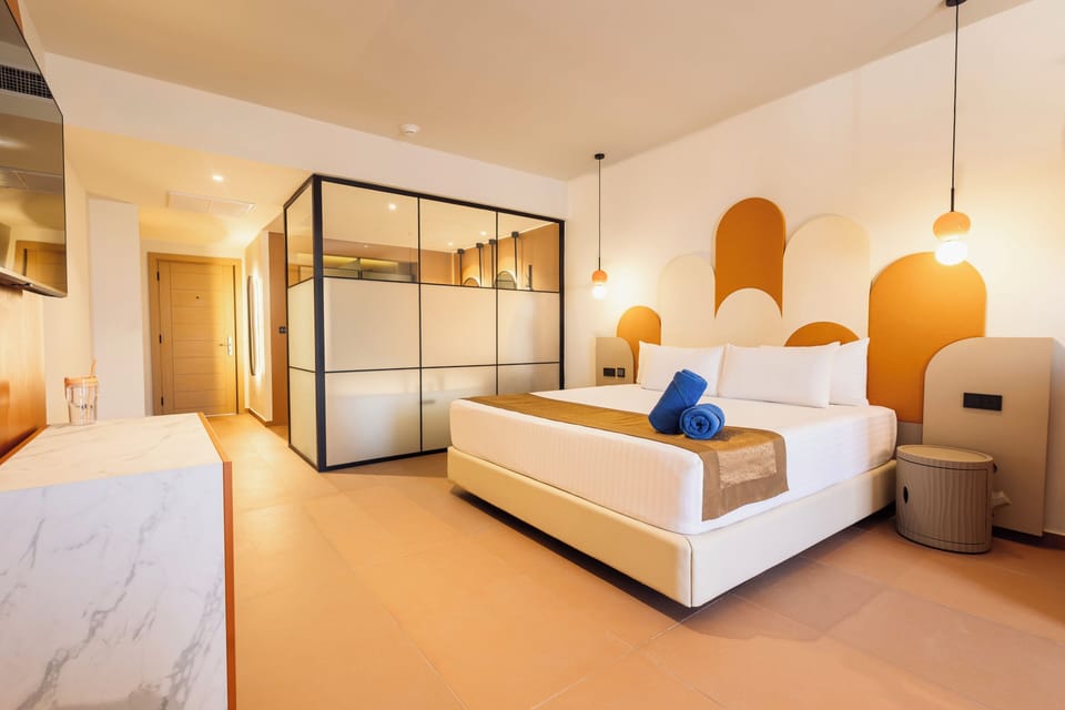 Free minibar, in-room safe, desk, iron/ironing board
