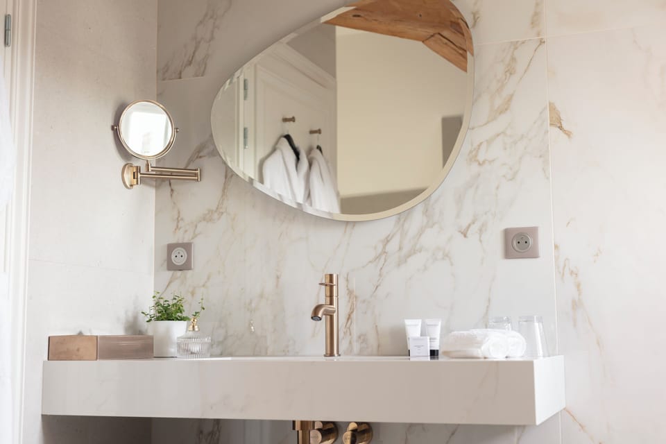 Family Suite | Bathroom | Hair dryer, slippers, towels, soap
