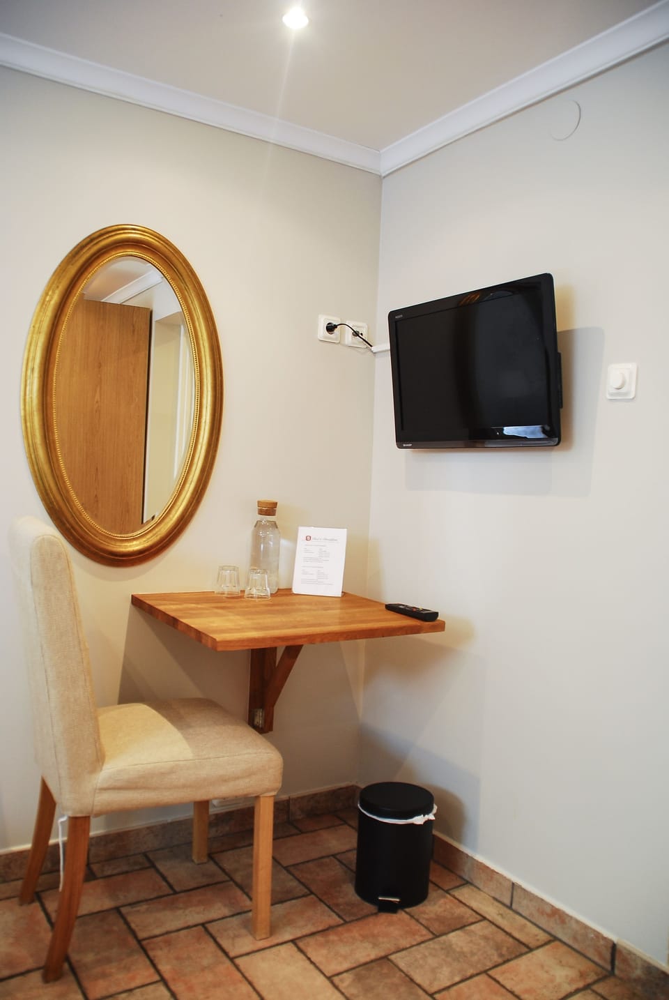 Twin Room, Shared Bathroom | Desk, laptop workspace, blackout drapes, iron/ironing board
