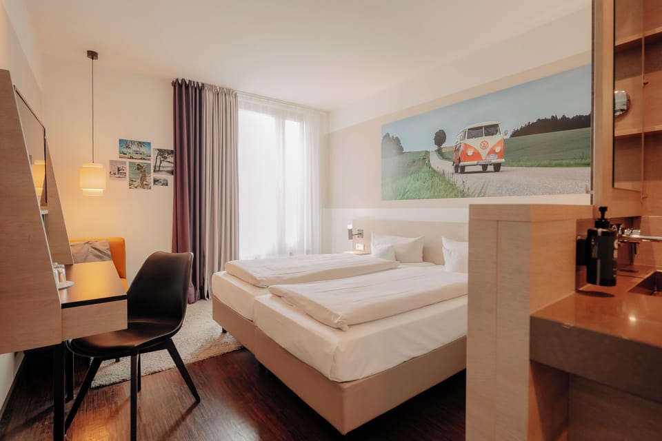 Hypo-allergenic bedding available, in-room safe, desk, laptop workspace