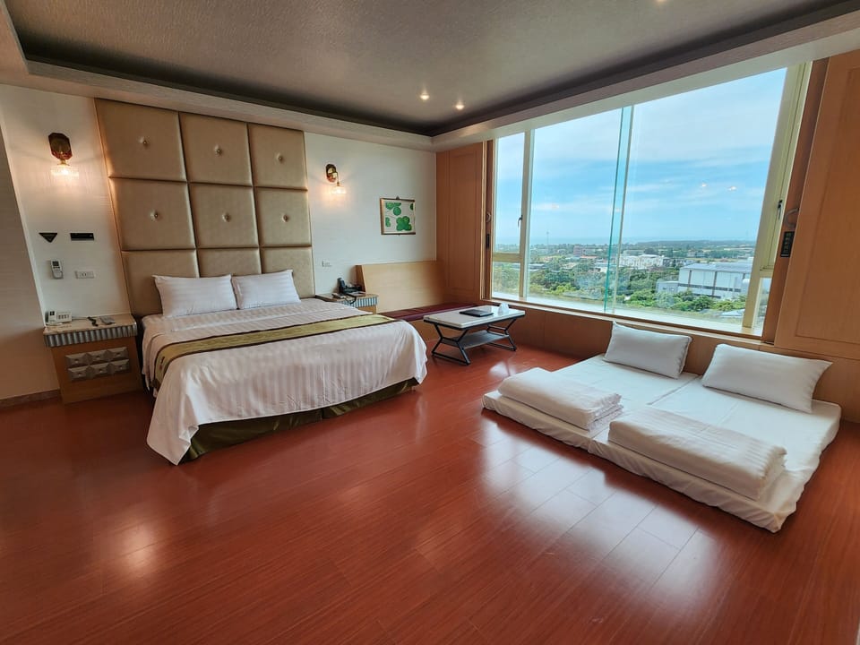 Panoramic Quadruple Room, Multiple Beds, Non Smoking, Ocean View | Soundproofing, free WiFi, bed sheets