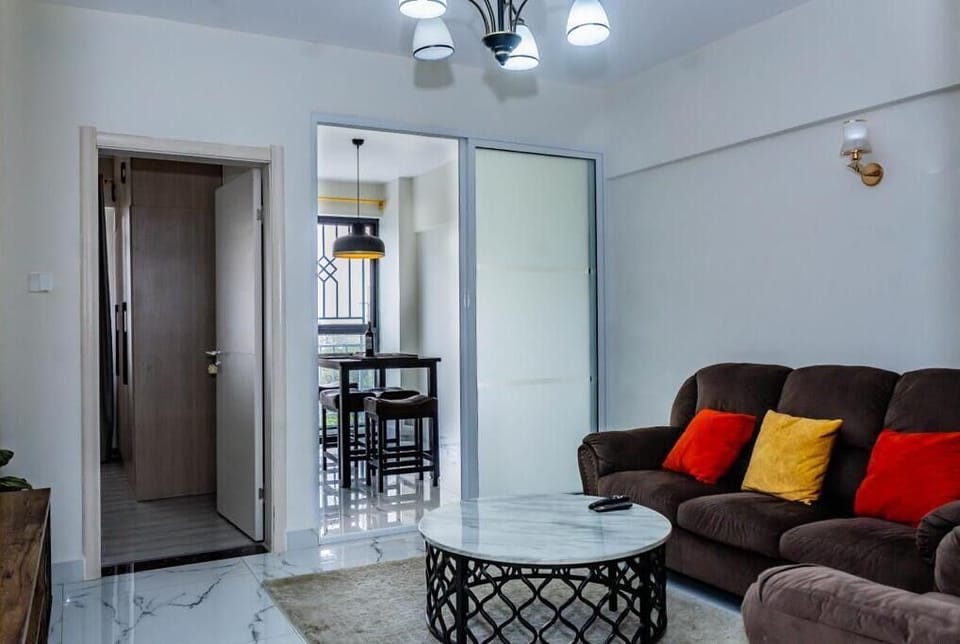 Business Apartment | Living area | 24-inch Smart TV with digital channels