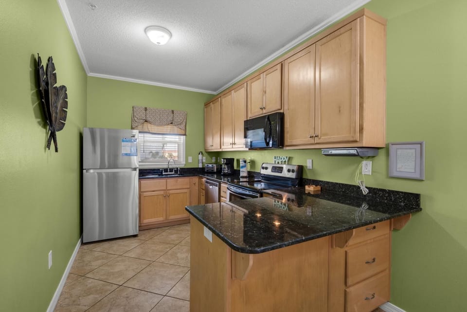 Apartment, Multiple Beds (Villas on the Gulf unit J1) | Private kitchen