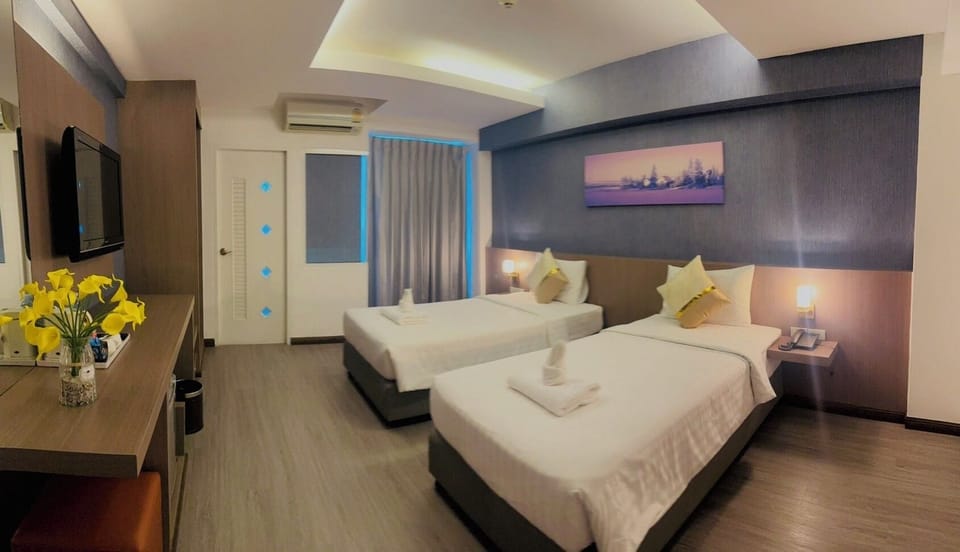Comfort Twin Room, City View | Desk, laptop workspace, free WiFi, bed sheets