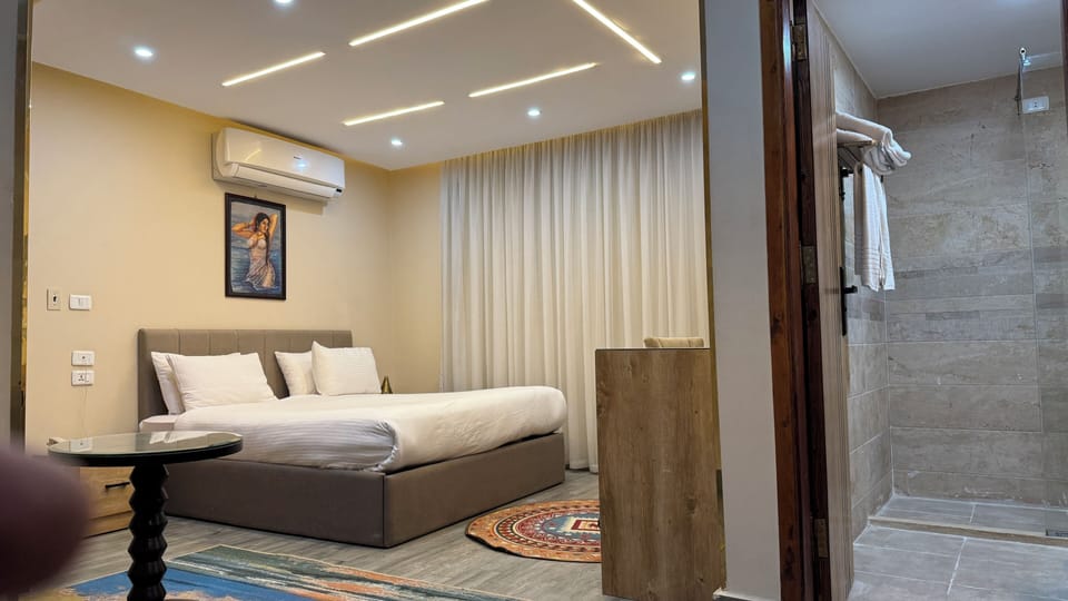 Egyptian cotton sheets, premium bedding, down comforters, minibar