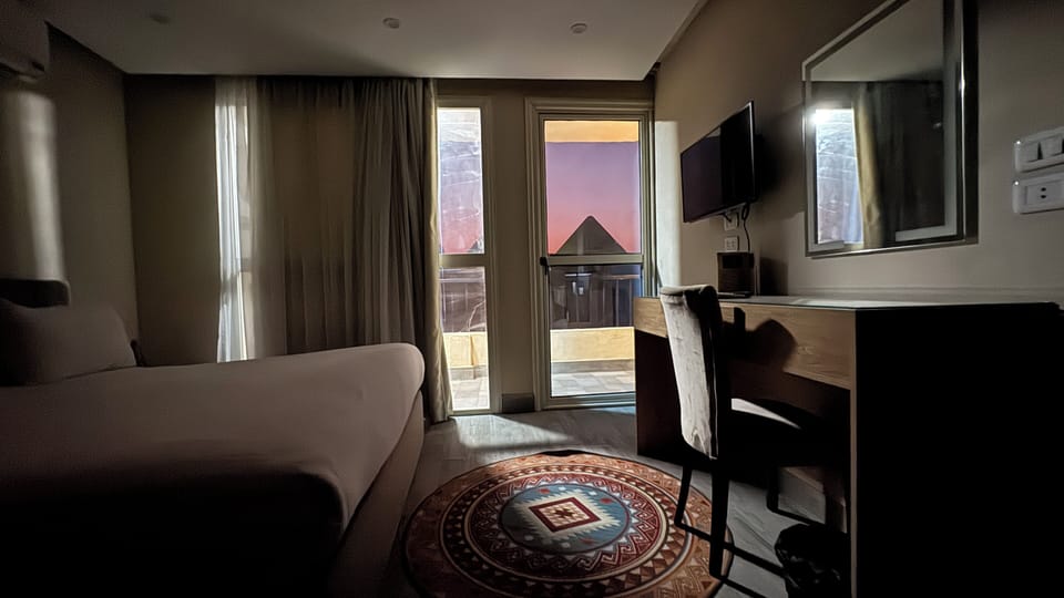 King Room With Pyramids View | Egyptian cotton sheets, premium bedding, down comforters, minibar