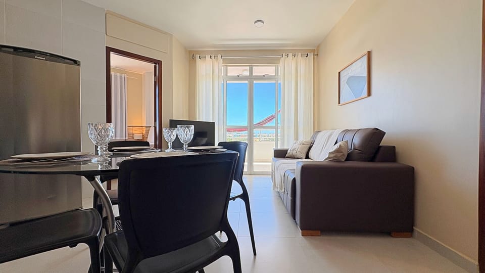 Apartment | Living area | 43-inch Smart TV with satellite channels