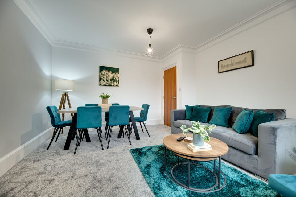City Apartment | Living area | 50-inch Smart TV with digital channels