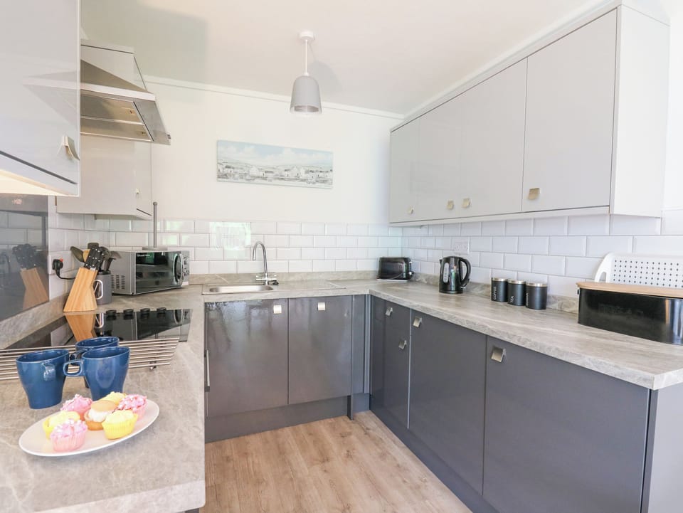 Fridge, dishwasher, electric kettle, cookware/dishes/utensils