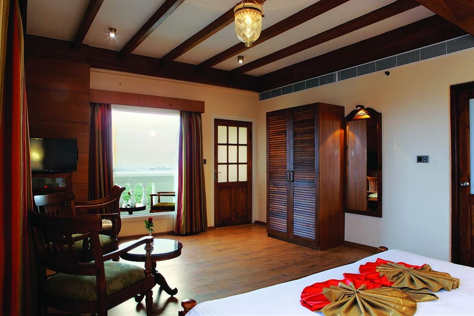 Grand Suite, 1 King Bed | Living area | TV