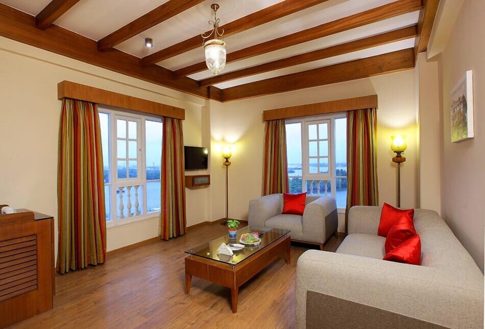Grand Suite, 1 King Bed | Living area | TV