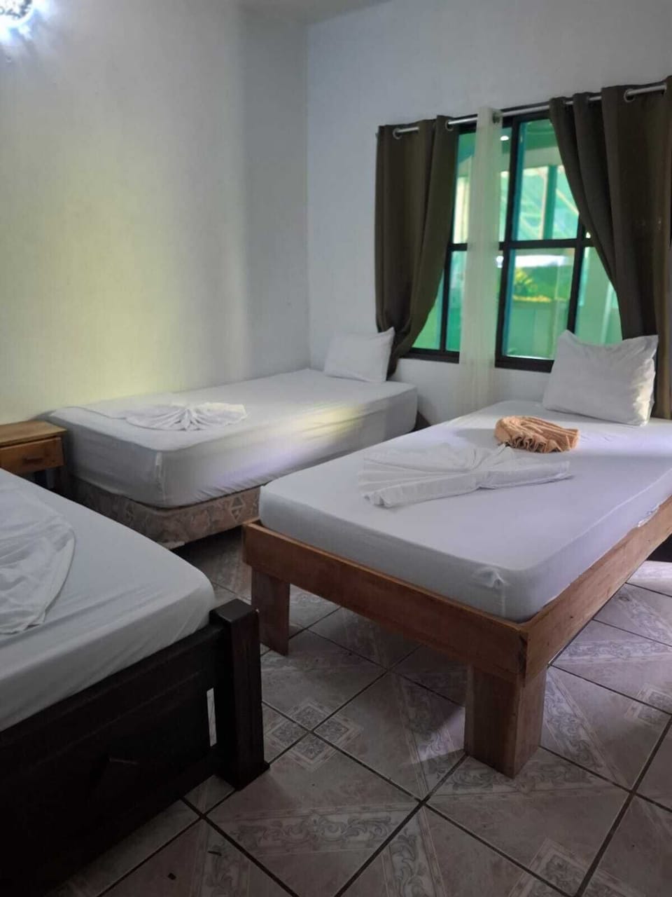 Economy Quadruple Room, 1 Bedroom | WiFi (free), bed sheets