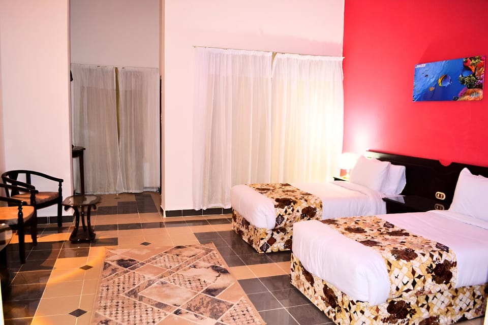 Standard Twin Room | Minibar, in-room safe, blackout drapes, free rollaway beds