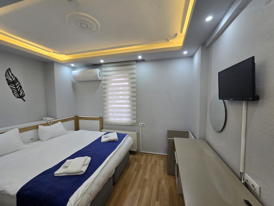 Standard Double Room, City View | Premium bedding, minibar, individually furnished, free WiFi